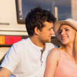 Couple relaxing at their RV site at Bayberry RV Park in Gulfport, MS during a Valentine’s Day Gulf Coast getaway.