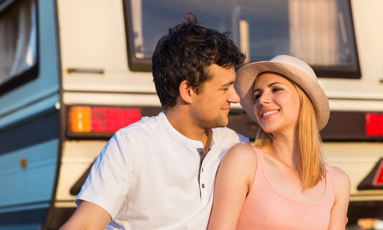 Couple relaxing at their RV site at Bayberry RV Park in Gulfport, MS during a Valentine’s Day Gulf Coast getaway.