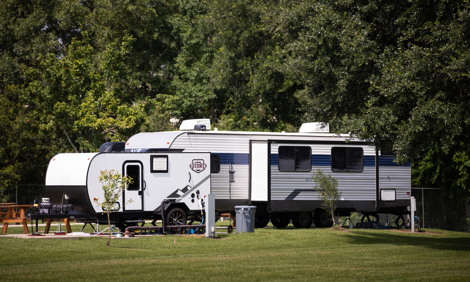 Spacious RV site at Bayberry RV Park with full hookups, shaded areas, and picnic table ready for a long-term stay on the Mississippi Gulf Coast.