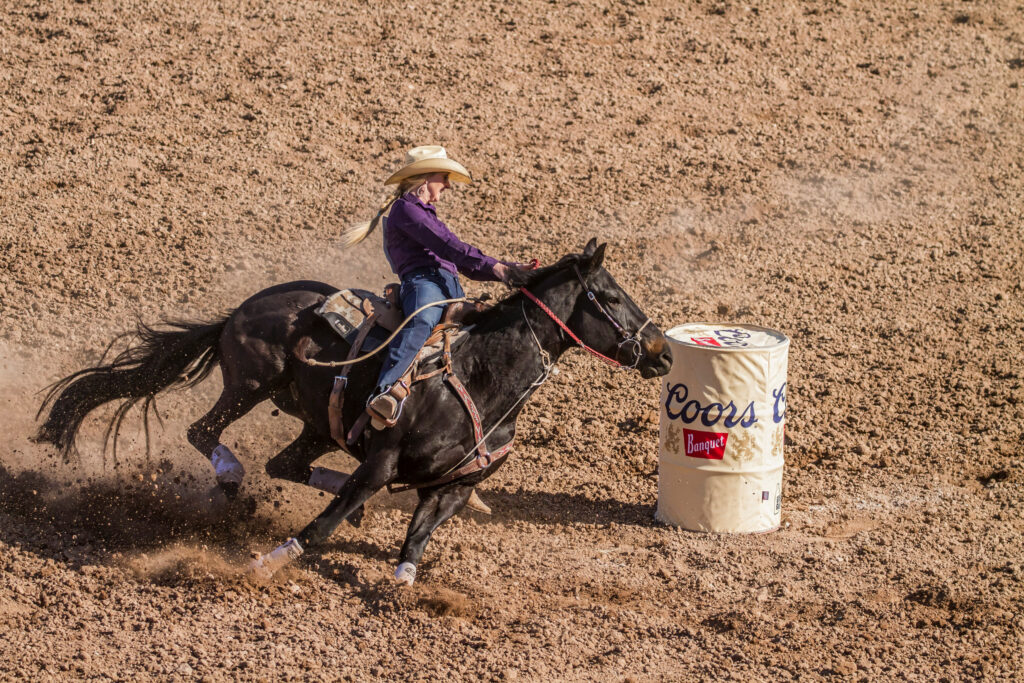 Woman barrel racing at the Georgia National Rodeo in Perry, Georgia near Twin Oaks RV Park.