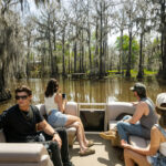 Friends enjoying a swamp tour during Memorial Day Weekend near Shreveport, LA