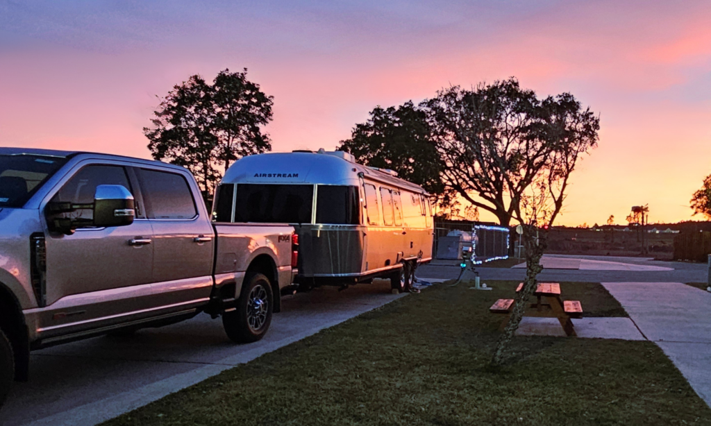 RV parked at Bayberry RV Park during sunset in Gulfport Mississippi