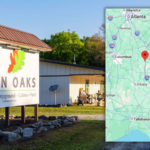 Twin Oaks RV Park entrance sign with map showing its convenient location along I-75 in Middle Georgia, an ideal stop for snowbird travelers.