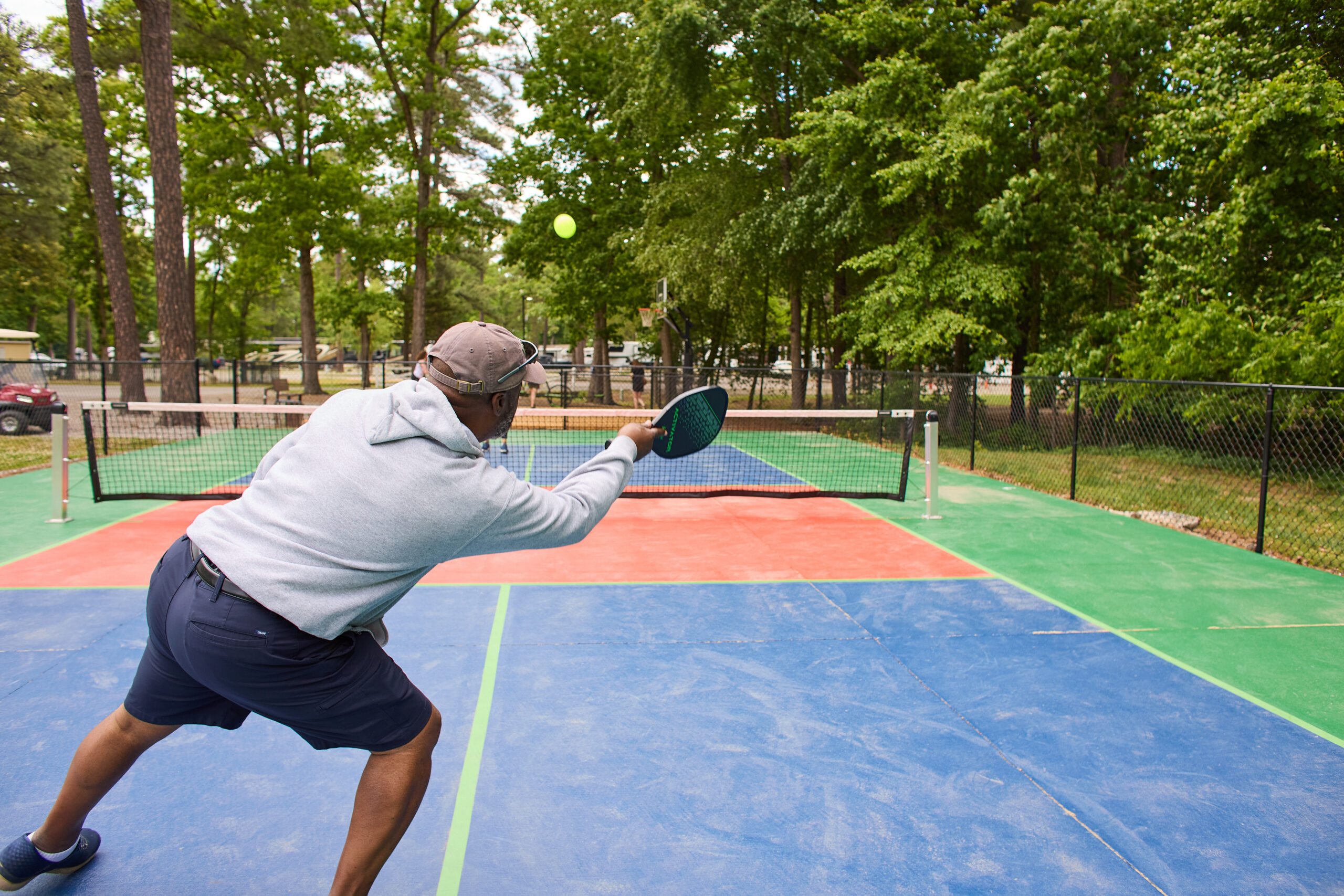 Guests enjoying a round of pickleball over Labor Day Weekend at Americamps RV Resort just outside Richmond, Virginia.