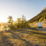 RV heading toward the sun for a warmer stay at a Streamside resort along their snowbird route south.