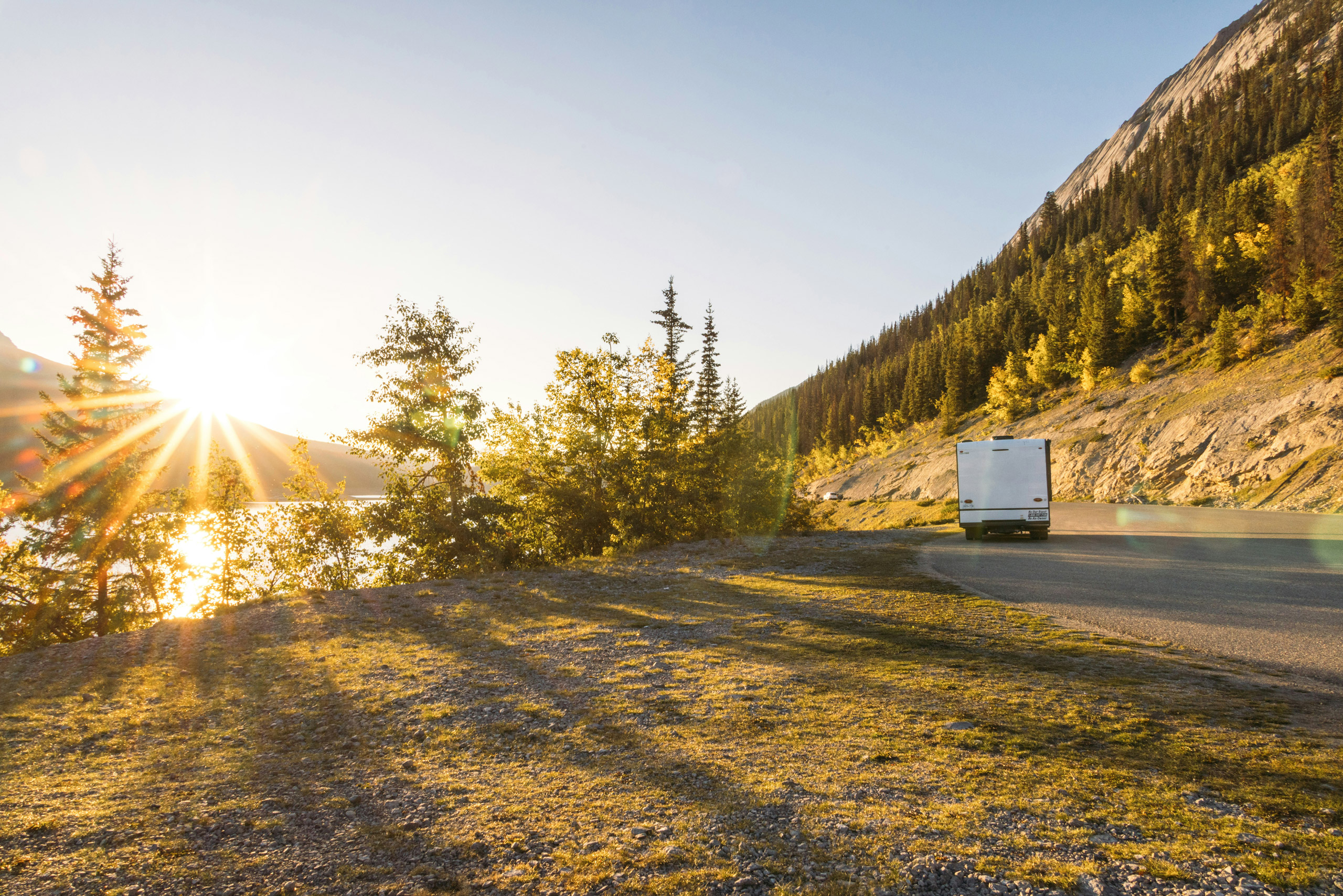 RV heading toward the sun for a warmer stay at a Streamside resort along their snowbird route south.